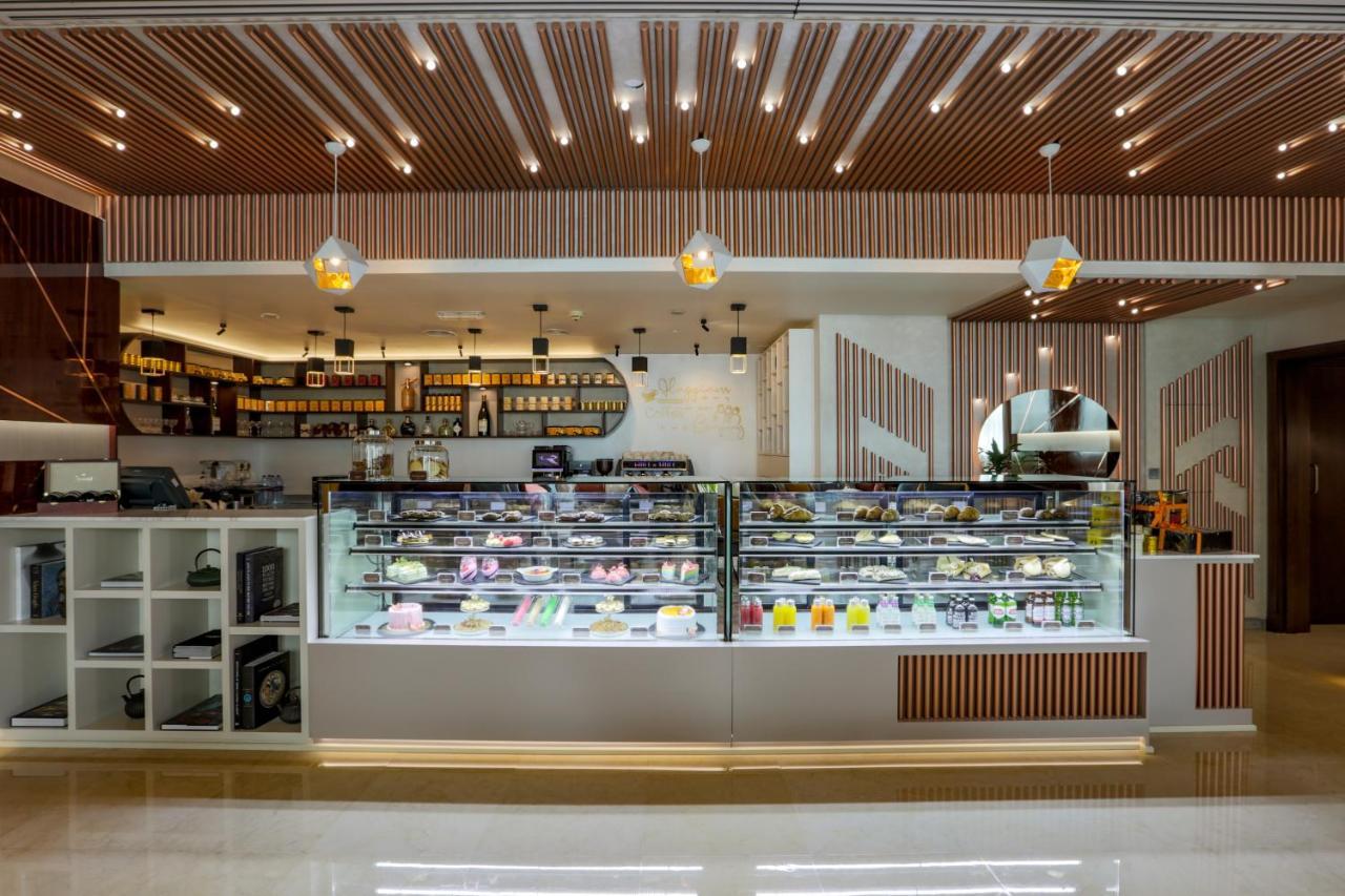 Park Regis Kris Kin Hotel Dubai Exterior photo A pastry shop in Bangkok, Thailand
