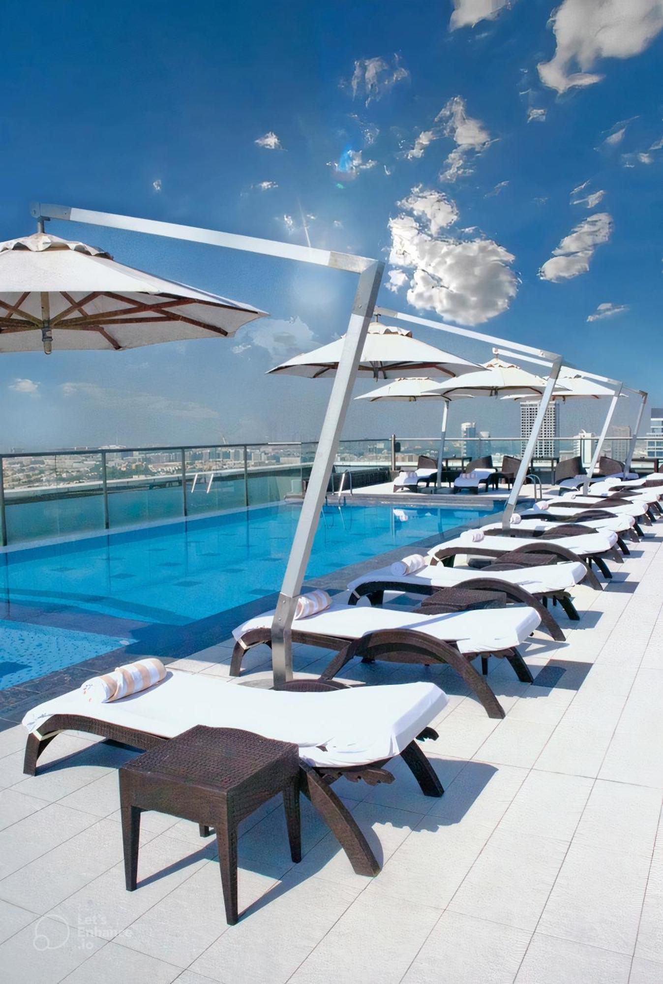 Park Regis Kris Kin Hotel Dubai Exterior photo Rooftop pool
